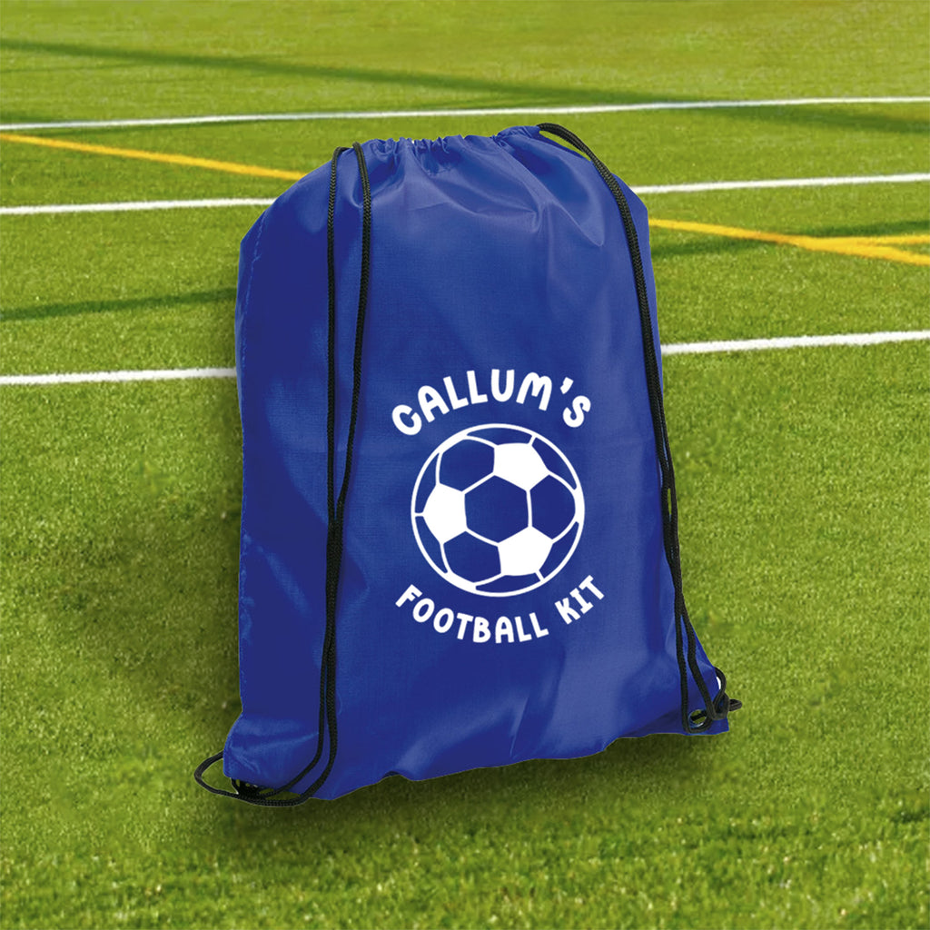 Blue drawstring bag with 'Callum's Football Kit' text on a grass field