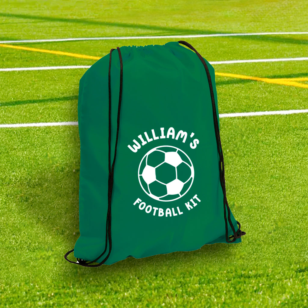 Green drawstring bag with 'William's Football Kit' text on a grass field