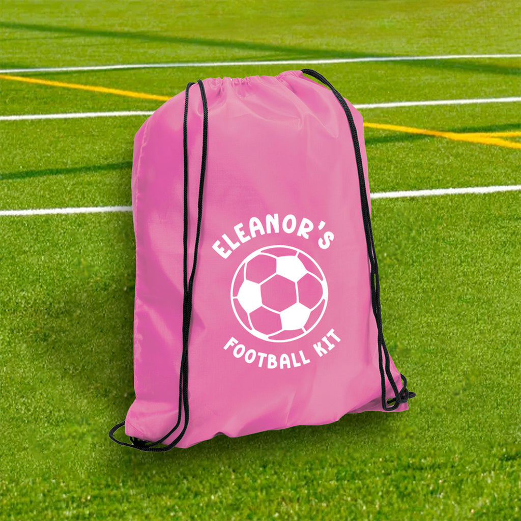 Pink drawstring bag with 'Eleanor's Football Kit' text and soccer ball graphic on a grass field.