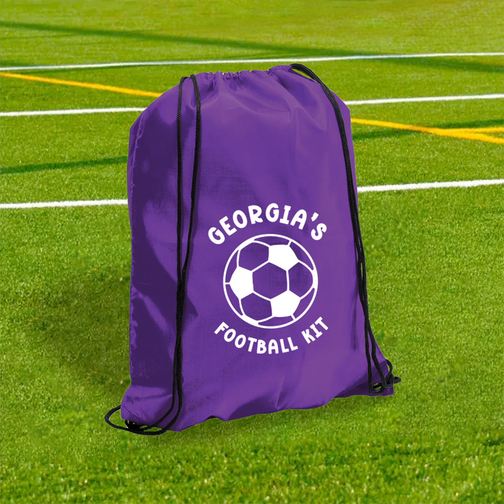 Purple drawstring bag with 'Georgia's Football Kit' text and soccer ball graphic on a grass field.