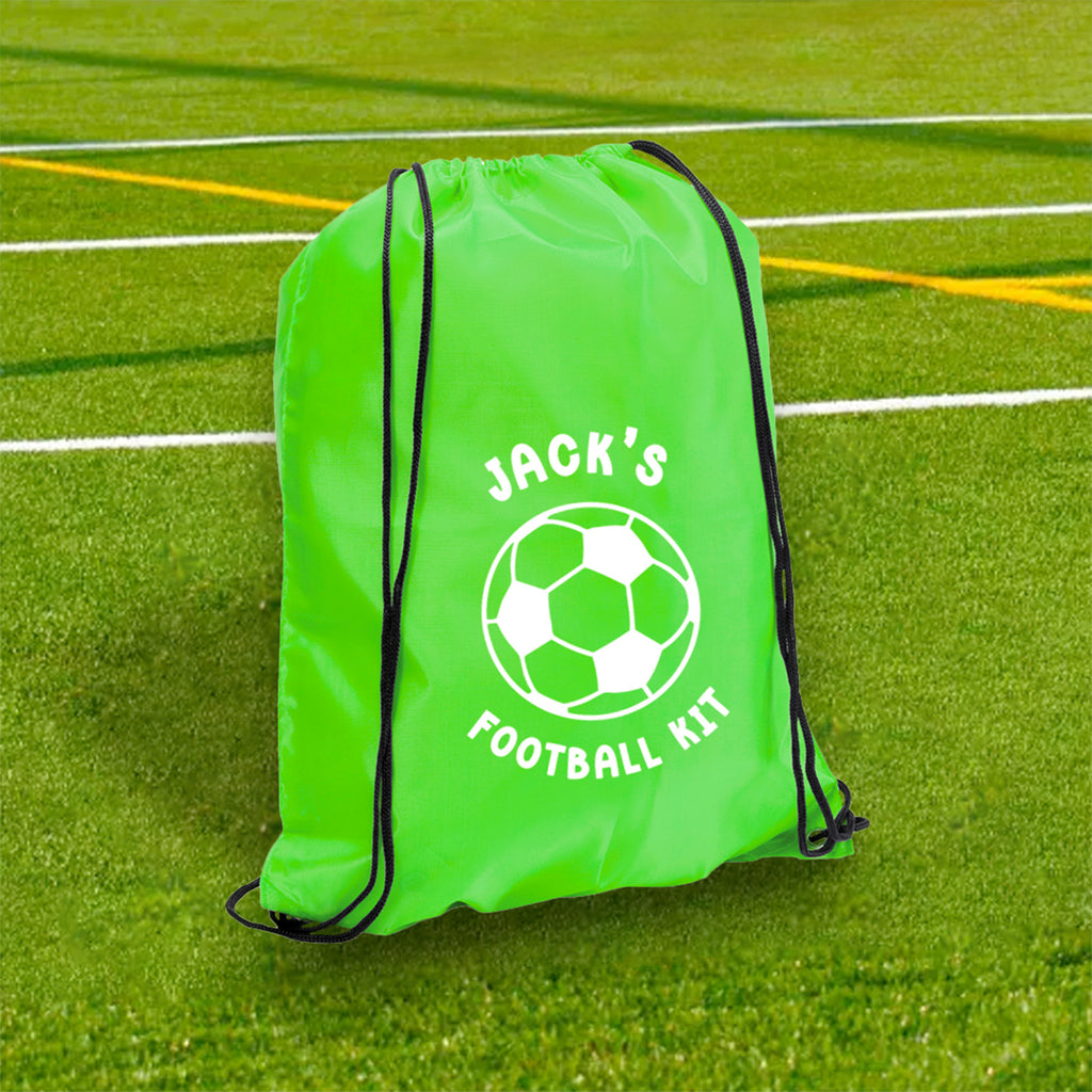 Green drawstring bag with 'Jack's Football Kit' text and soccer ball graphic on a grass field.