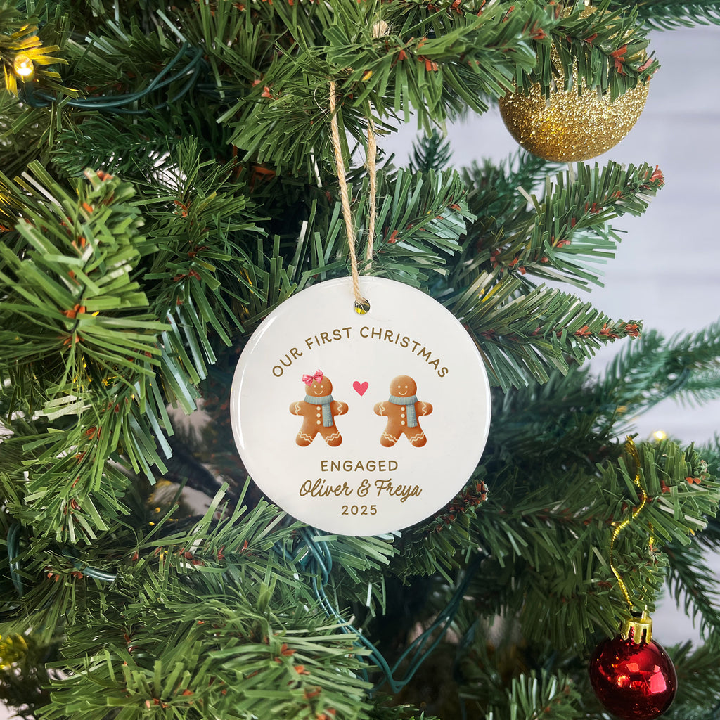 Decorative Christmas ornament with gingerbread men on a Christmas tree.